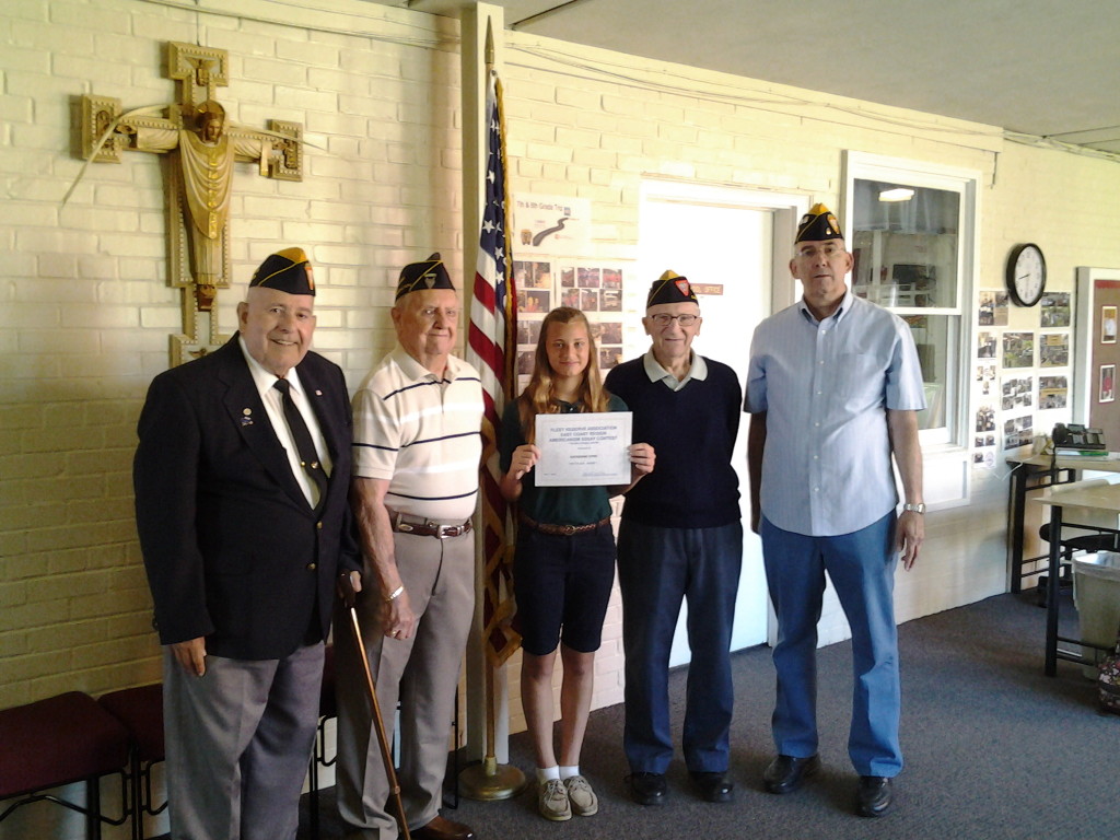 Seventh grade Regional essay contest winner Katherine Dyke with S/M's Broussard, Hemmingway, Baum and Rogers at Infant of Prague on 2 June 2014.