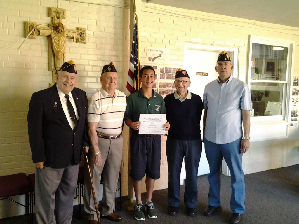 Eighth grade second place Regional essay contest winner Joseph Johnson with S/M's Broussard, Hemmingway, Baum and Rogers at Infant of Prague School on 2 June 2014. 