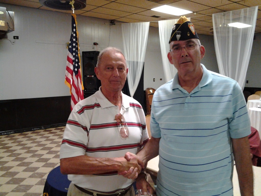 Shipmate Rothermel receiving his 30 continuous membership pin from Shipmate Rogers on 12 August 2014