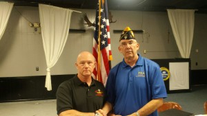 SHIPMATE JOSEPH ESTEP RECEIVING HIS 15 YEAR CONTINUOUS MEMBERSHIP PIN FROM SHIPMATE MARK ROGERS ON 9 AUGUST 2016